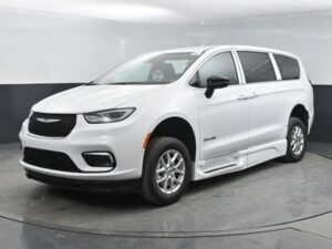 White Chrysler Pacifica with BraunAbility Side Entry Automatic Fold Out conversion