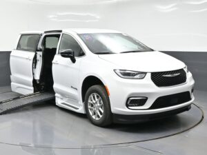 White Chrysler Pacifica with BraunAbility Side Entry Automatic Fold Out conversion