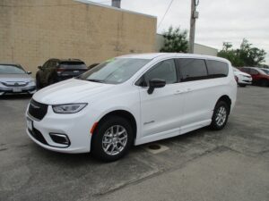 White Chrysler Pacifica with BraunAbility Side Entry Automatic Fold Out conversion