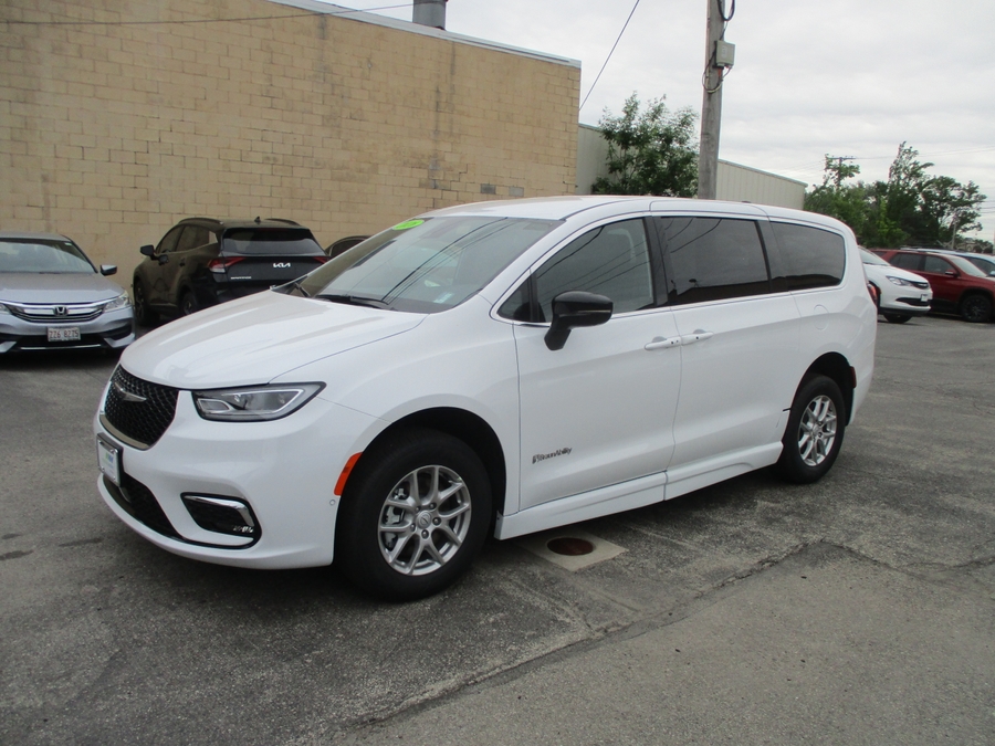 White Chrysler Pacifica with BraunAbility Side Entry Automatic Fold Out conversion