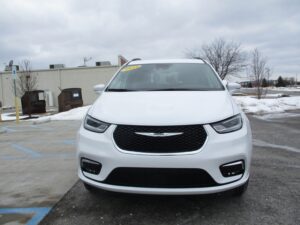 White Chrysler Pacifica with Driverge Side Entry Automatic Fold Out conversion
