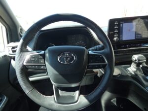White Toyota Sienna with BraunAbility Side Entry Automatic Fold Out conversion