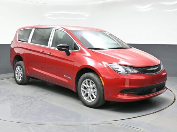 Red Chrysler Voyager with BraunAbility Rear Entry Manual Fold Out conversion
