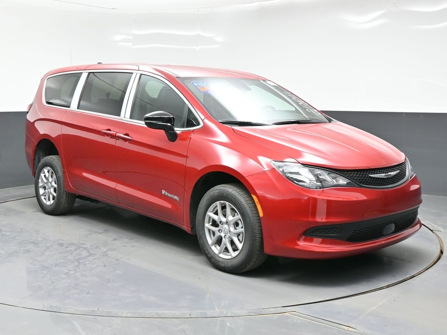 Red Chrysler Voyager with BraunAbility Rear Entry Manual Fold Out conversion