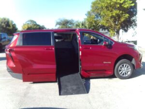 Red Toyota Sienna with BraunAbility Side Entry Automatic Fold Out conversion