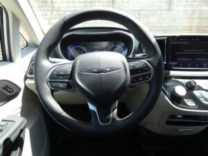 Silver Chrysler Pacifica with BraunAbility Side Entry Automatic Fold Out conversion
