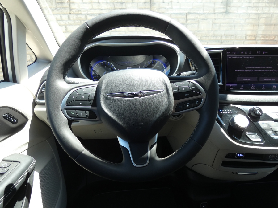 Silver Chrysler Pacifica with BraunAbility Side Entry Automatic Fold Out conversion