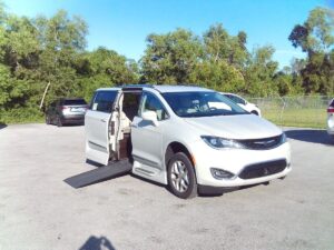 White Chrysler Pacifica with Vantage Mobility Side Entry Automatic In Floor conversion