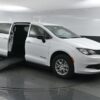 White Chrysler Voyager with BraunAbility Side Entry Manual Fold Out conversion