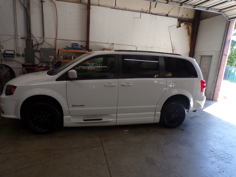 White Dodge Grand Caravan with BraunAbility Side Entry Automatic Fold Out conversion