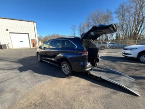 Blue Toyota Sienna with Driverge Rear Entry Manual Fold Out conversion