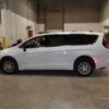 White Chrysler Voyager with Driverge Rear Entry Manual Fold Out conversion