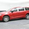 Red Chrysler Voyager with BraunAbility Rear Entry Manual Fold Out conversion