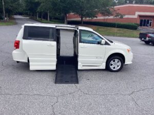 White Dodge Grand Caravan with BraunAbility Side Entry Automatic Fold Out conversion