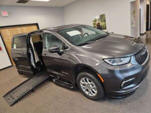 Grey Chrysler Pacifica with BraunAbility Side Entry Automatic Fold Out conversion