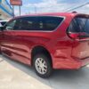 Red Chrysler Pacifica with BraunAbility Side Entry Automatic Fold Out conversion