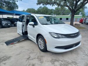White Chrysler Voyager with Driverge Side Entry Automatic Fold Out conversion