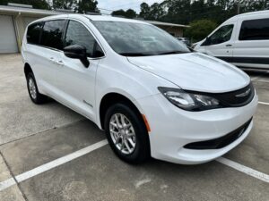 White Chrysler Voyager with BraunAbility Rear Entry Manual Fold Out conversion