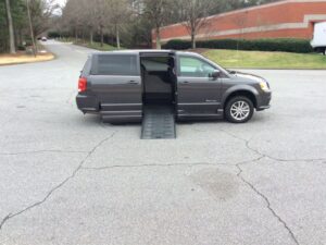 Grey Dodge Grand Caravan with BraunAbility Side Entry Automatic In Floor conversion