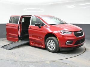 Red Chrysler Pacifica with BraunAbility Side Entry Automatic Fold Out conversion