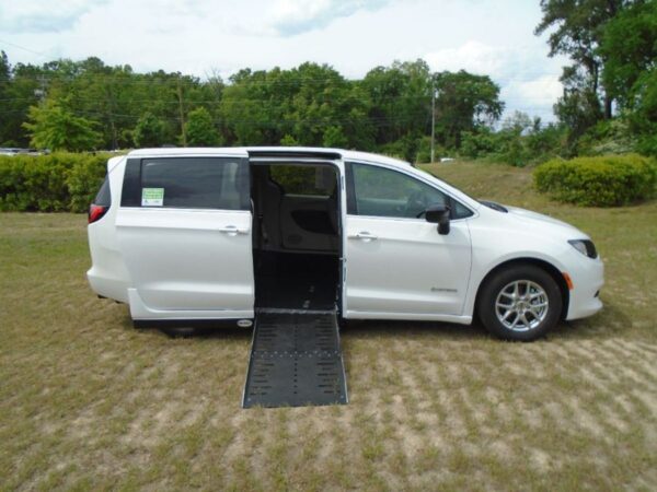 White Chrysler Voyager with Driverge Side Entry Automatic Fold Out conversion