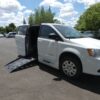 White Dodge Grand Caravan with BraunAbility Side Entry Manual Fold Out conversion