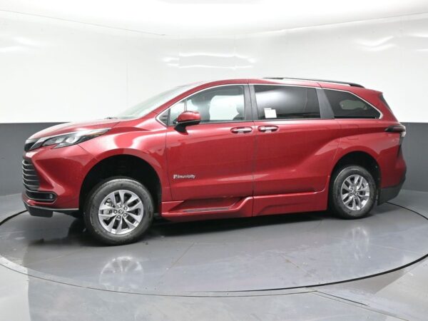 Red Toyota Sienna with BraunAbility Side Entry Automatic Fold Out conversion