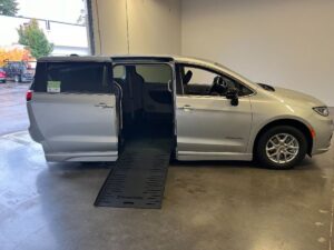 Silver Chrysler Pacifica with BraunAbility Side Entry Automatic Fold Out conversion