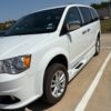 White Dodge Grand Caravan with BraunAbility Side Entry Automatic Fold Out conversion