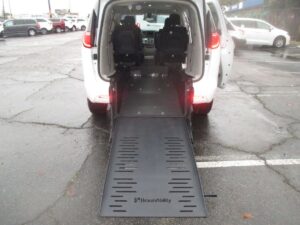 White Chrysler Voyager with BraunAbility Rear Entry Manual Fold Out conversion