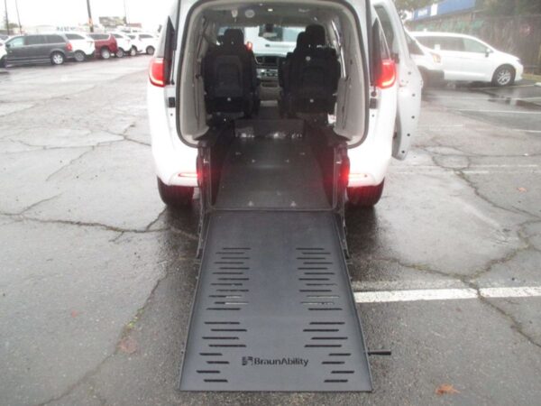 White Chrysler Voyager with BraunAbility Rear Entry Manual Fold Out conversion