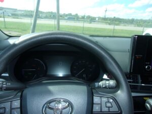 Silver Toyota Sienna with BraunAbility Side Entry Automatic Fold Out conversion
