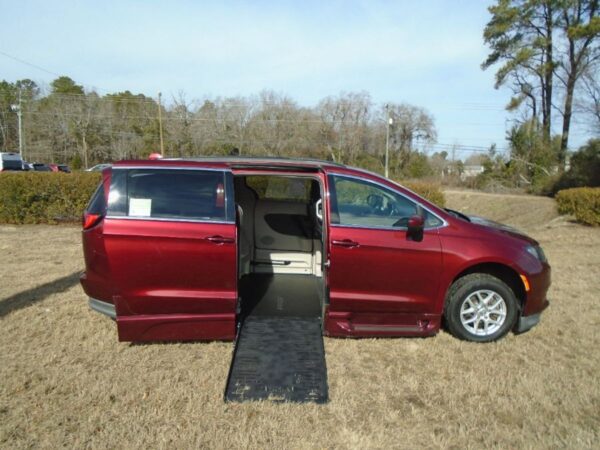 Red Chrysler Voyager with BraunAbility Side Entry Automatic Fold Out conversion