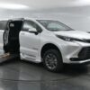 White Toyota Sienna with BraunAbility Side Entry Automatic Fold Out conversion