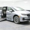 Silver Honda Odyssey with BraunAbility Side Entry Automatic In Floor conversion