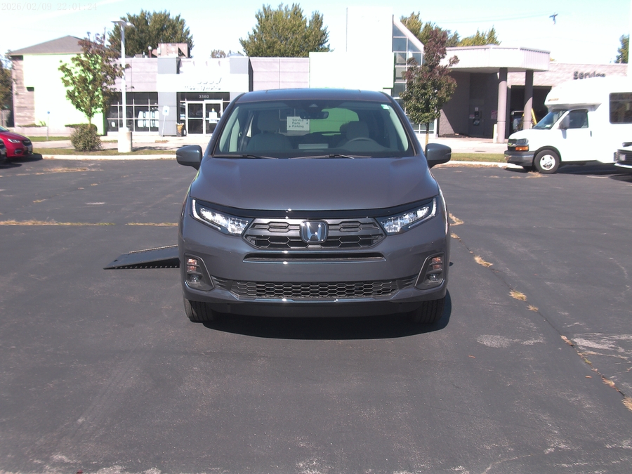 Blue Honda Odyssey with BraunAbility Side Entry Automatic In Floor conversion