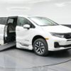 White Honda Odyssey with BraunAbility Side Entry Automatic In Floor conversion