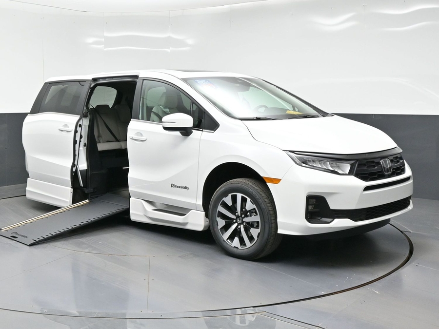 White Honda Odyssey with BraunAbility Side Entry Automatic In Floor conversion
