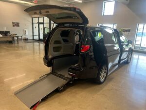 Black Chrysler Pacifica with Driverge Rear Entry Manual Fold Out conversion