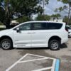 White Chrysler Pacifica with Driverge Side Entry Automatic Fold Out conversion