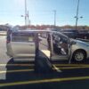 Silver Chrysler Voyager with BraunAbility Side Entry Automatic Fold Out conversion