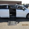 White Chrysler Voyager with Driverge Side Entry Automatic Fold Out conversion