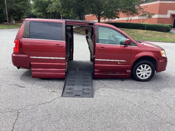 Red Chrysler Town and Country with BraunAbility Side Entry Automatic Fold Out conversion