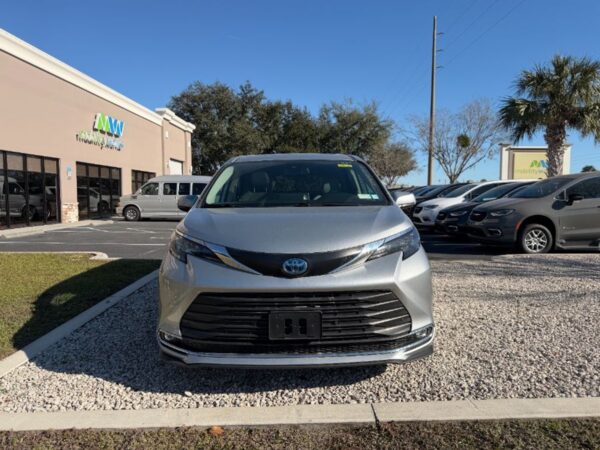 Silver Toyota Sienna with Driverge Rear Entry Manual Fold Out conversion
