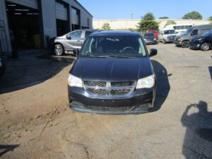 Grey Dodge Grand Caravan with BraunAbility Side Entry Automatic Fold Out conversion