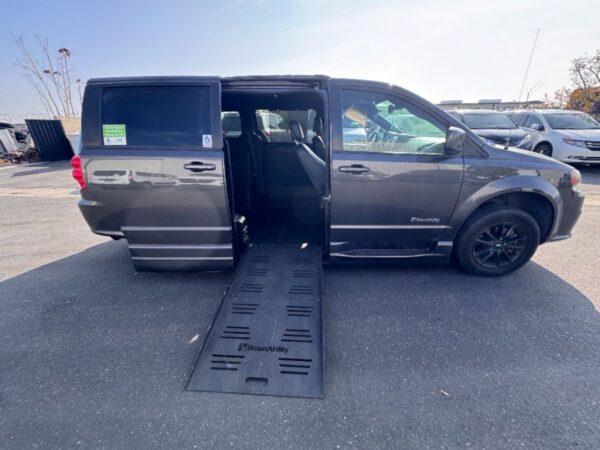 Grey Dodge Grand Caravan with BraunAbility Side Entry Automatic Fold Out conversion