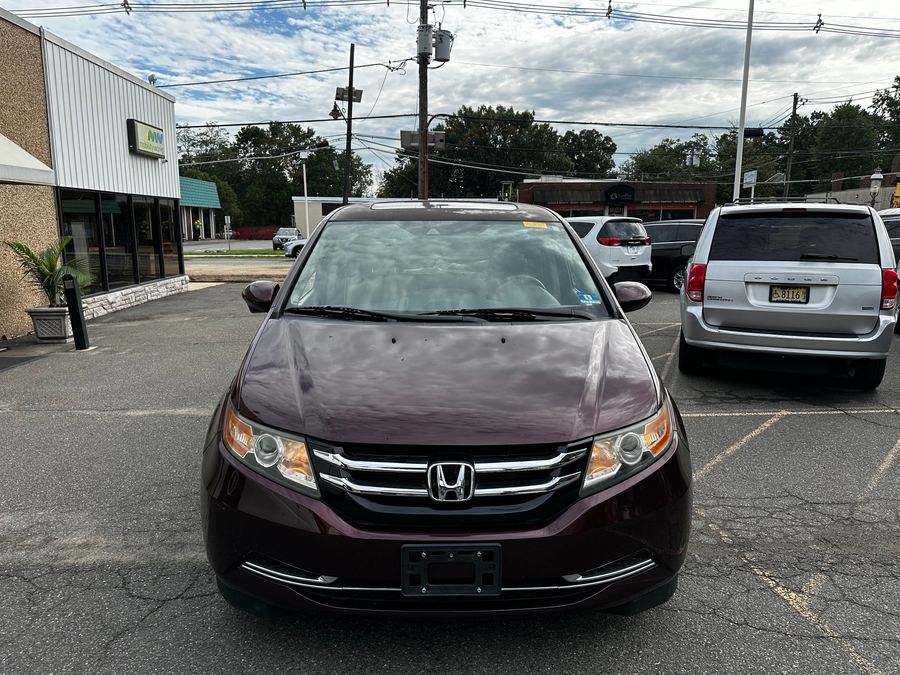 Red Honda Odyssey with Vantage Mobility Side Entry Automatic In Floor conversion