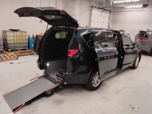 Blue Chrysler Pacifica with Driverge Rear Entry Manual Fold Out conversion