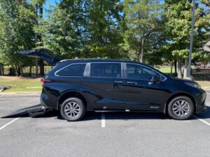 Black Toyota Sienna with Driverge Rear Entry Manual Fold Out conversion
