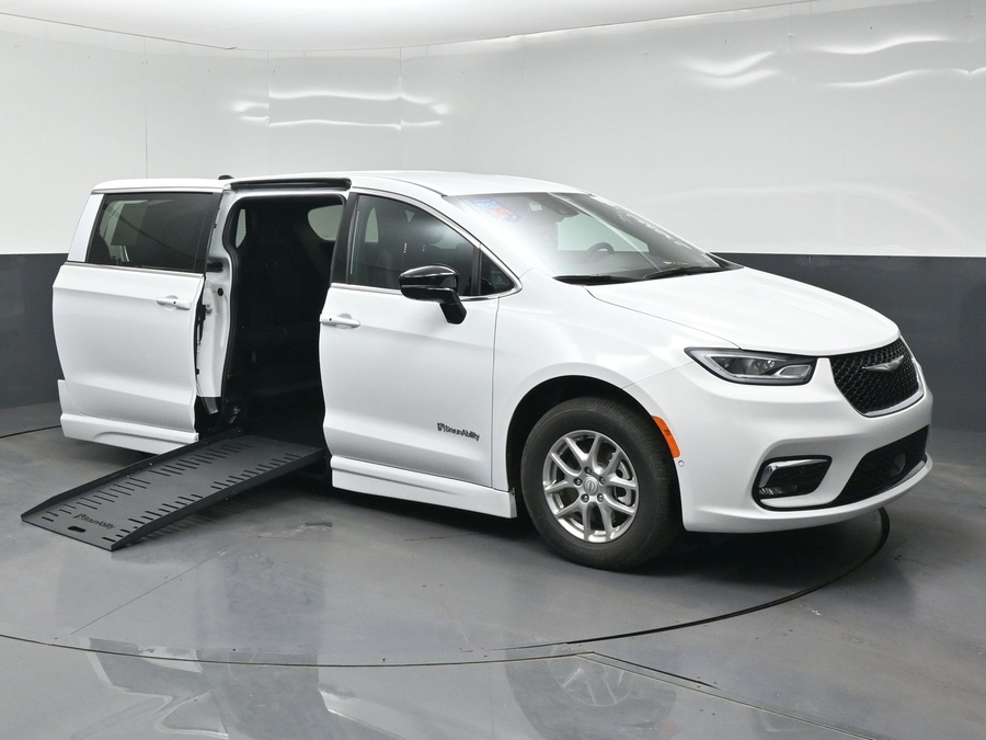 White Chrysler Pacifica with BraunAbility Side Entry Automatic Fold Out conversion